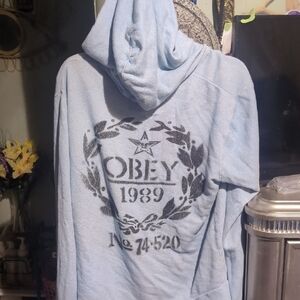 Obey Light Blue Zip-Up Hoodie Sweater with Crest